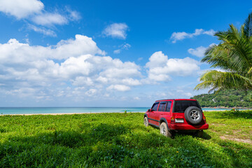 13 December 2022 Red 4x4 car Suzuki Vitara 1993 on the karon beach, Tropical sea view Beautiful...