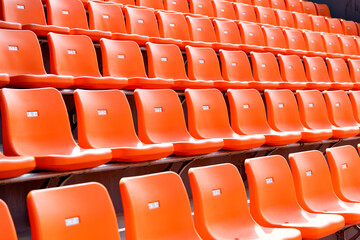 Fototapeta premium Empty orange seat in stadium
