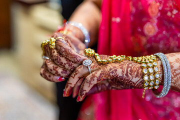 Indian Hindu bride's wedding henna mehendi mehndi hands close up