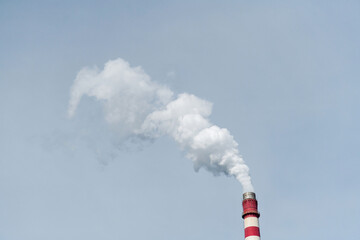 White smoke from factory chimney