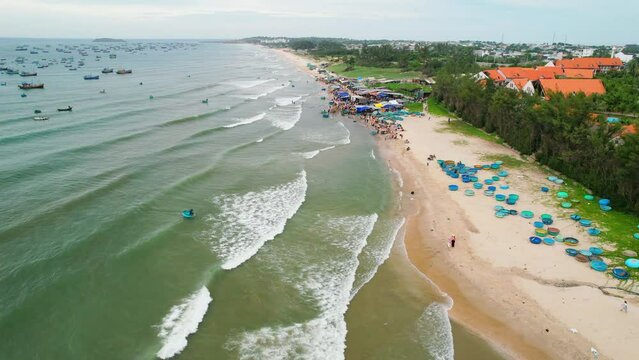 Fish market seen from above in Mui Ne, Vietnam. The morning market in a coastal fishing village to buy and sell seafood for the central provinces of Vietnam