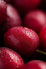 Fresh cherries with water droplets. Close up. Macro shot.