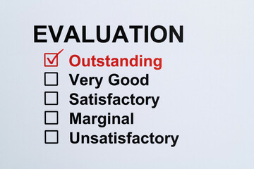 Tick the outstanding box on evaluation form