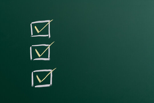 Checklist ticks on the chalkboard