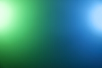 Blue and green lights on black background
