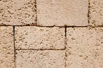Stone bricks as background, closeup