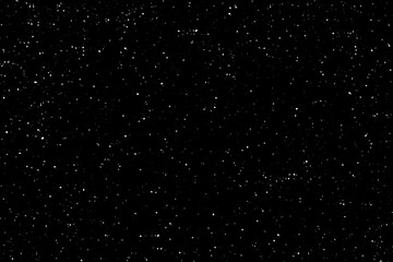 Starry night sky.  Galaxy space background.  Glowing stars in space.  Night sky with plenty stars.  Christmas, New Year and all celebration backgrounds concepts.