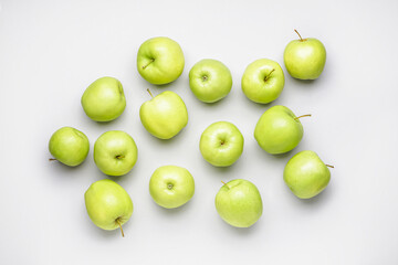 Fresh green apples on white background