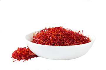 Dried saffron spices in a ceramic bowl isolated on white background.