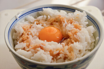 Raw egg on a bowl of rice Japanese Tamagokakegohan