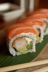 Set of different sushi and rolls wood desk top view nature food chopstick japan traditional fish tasty closeup