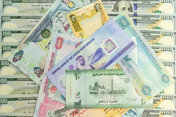 United Arab Emirate bank notes with a US dollar bills