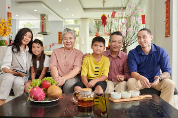 Three generation of big family celebrating Chinese New Year at home