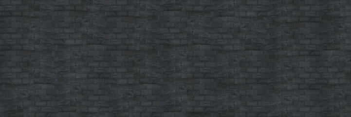 horizontal dark gray and black modern brick wall for pattern and background.