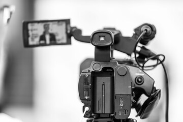 TV Camera Recording a Publicity Event