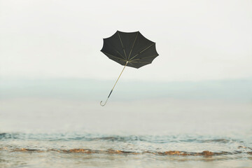umbrella flying in the sky, concept of solitude and freedom