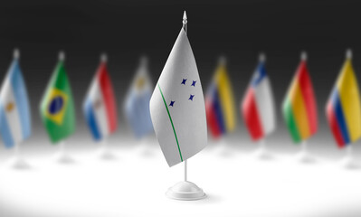 The national flag of the Mercosur on the background of flags of other countries