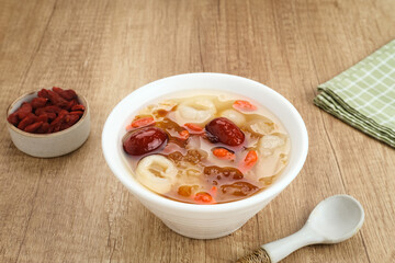 Peach Gum, Chinese traditional drink that contains peach gum, bird nest, red dates, snow fungus, goji berry, and rock sugar. 
