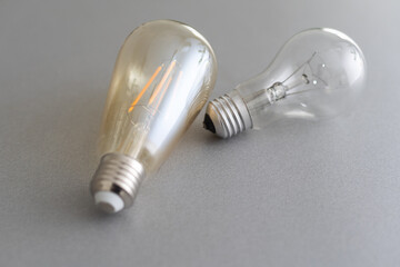 Realistic photo image of light bulbs. isolated bulbs, fluorescent bulbs, orange old generation bulb, Tungsten bulb, and white energy saving bulb