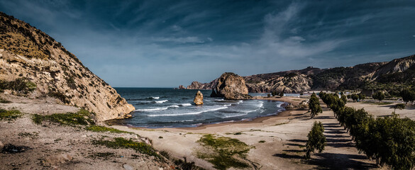 panoramic view of crick beach and rocks