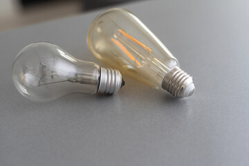 Realistic photo image of light bulbs. isolated bulbs, fluorescent bulbs, orange old generation bulb, Tungsten bulb, and white energy saving bulb