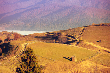 Top view of the colorful slopes of the mountains on an autumn sunny day. Beautiful landscape....