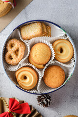 cookies in a Christmas box on a light background