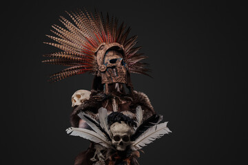 Antique aztec shaman with staff dressed in ceremonial attire. High quality photo