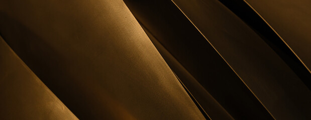 Stainless metal industrial matallic dark abstract background for modern design in warm light