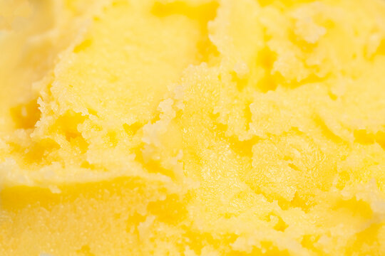 Homemade melted ghee clarified butter close up macro food background