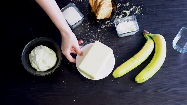 Cooking Banoffi cake at home in the kitchen, pastry recipe.