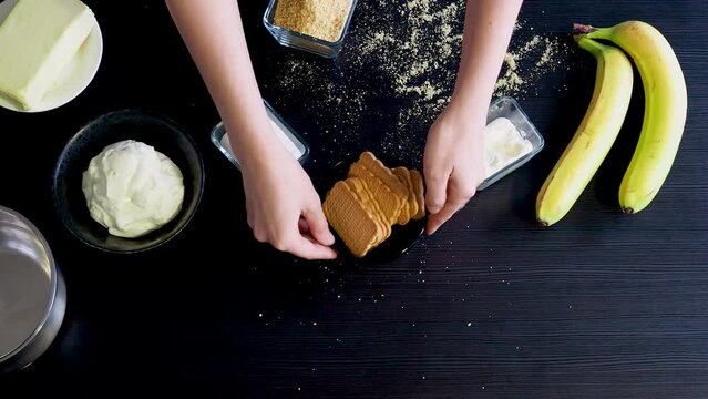 Cooking Banoffi cake at home in the kitchen, pastry recipe.