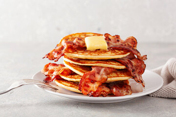 sweet pancakes with butter and bacon. traditional american breakfast