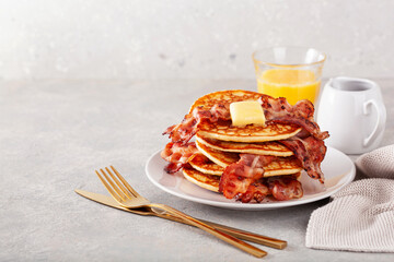 sweet pancakes with butter and bacon. traditional american breakfast