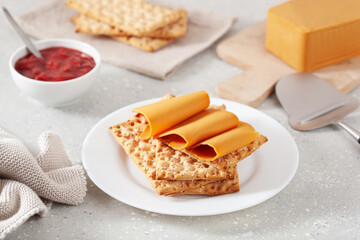 crispbread with Norwegian brunost traditional brown cheese