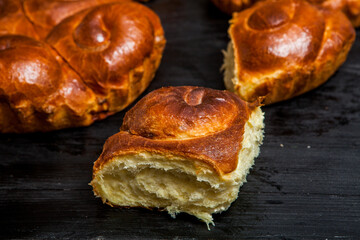 Fresh bread from the oven. Traditional cheese pie from Romania called Saralie. Homemade bread made from white wheat flour.
