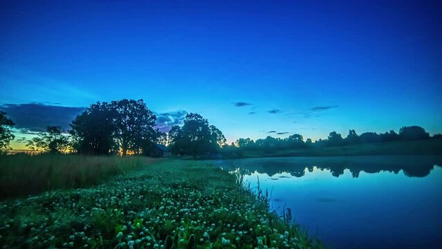 Epic Cinematic 24 hour Hyperlapse of Lake and Small Farmhouse 