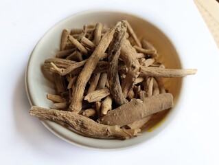 Organic Ashwagandha (Withania somnifera) roots.  Also known as Indian Ginseng or Indian Winter cherry. A well known ayrvedic herb, India.