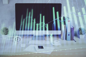 Forex graph hologram on table with computer background. Double exposure. Concept of financial markets.