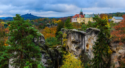 Fototapeta na wymiar The castle Hruba Skala in CHKO Cesky Raj from the Marianska vyhlidka viewpoint in autumn.