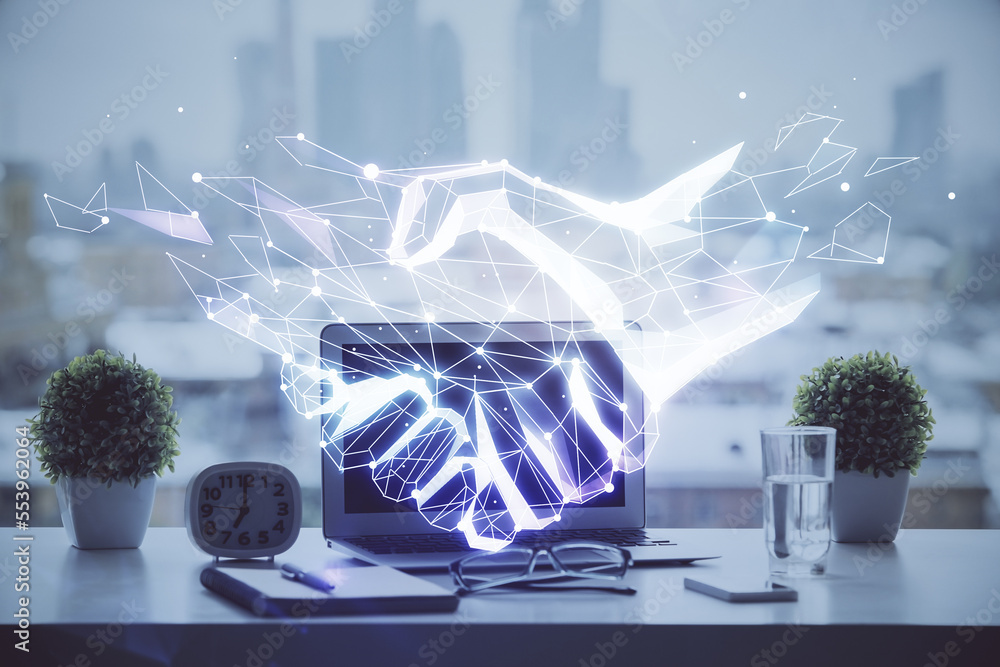 Poster desktop computer background in office and handshake hologram drawing. double exposure. pertnership c