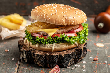 Close up burger with chicken cutlet and pineapple, fast food and junk food concept