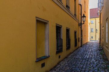 Narrow city street of European tourist cozy city. Background with selective focus and copy space