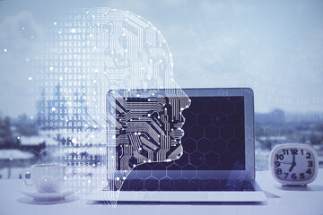 Double exposure of desktop with computer and brain drawing hologram. Artificial intelligence...