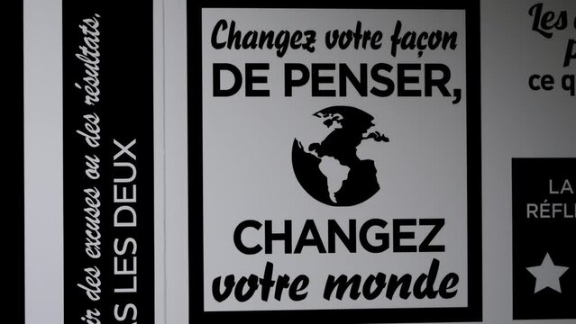 Close-up shot of a french poster telling the world to vote for change