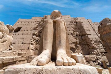 antique statue in the pillared hall in Luxor in Egypt