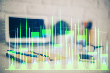 Forex Chart hologram on table with computer background. Double exposure. Concept of financial markets.