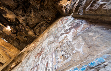 hieroglyphs on the wall of an ancient building in Egypt