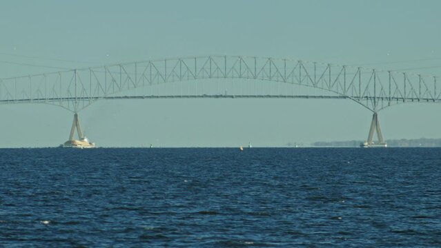 Francis Scott Key Bridge in Dundalk, Baltimore MD telephoto shot cars driving over the Patapsco River