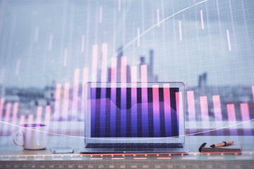 Forex Chart hologram on table with computer background. Double exposure. Concept of financial markets.